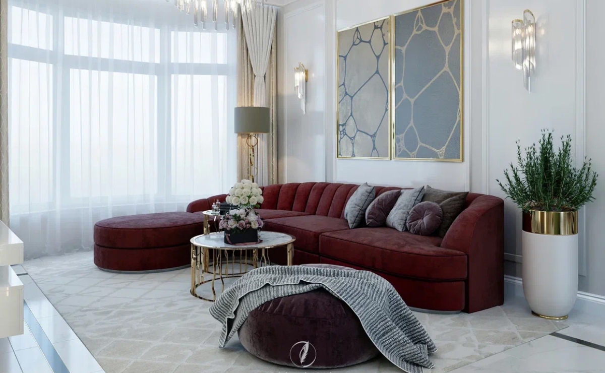 Главная задача для архитектора-дизайнера при создании проекта двухэтажного дома – это уделить особое внимание проектированию лестницы. Именно лестница является самым важным элементом, поскольку должна быть удобной для ежедневного использования. Ступени изготовлены из дерева, как и поручни, а ограждение – изящная ковка. На этом объекте лестница занимает центральное место, встречая нас в холле и соединяя все пространство первого этажа в единое целое. <br><br>
 
Весь дом наполнен «духом» стиля ар-деко. В этом стиле сконцентрировано максимальное количество материалов, соответствующих категории люкс. Главные черты архитектуры и дизайна интерьера этого дома – строгая геометрия и симметрия, контрасты (дерево + металл, золото + темные тона и т. д.), стилизация растительных мотивов (отделка стен в холле второго этажа, плитка на стенах и полу в ванных комнатах), мотив путешествий.
Стиль ар-деко чувствуется и в мебели: комоды, витрины, уютные интересной формы диван и круглые кресла, и визуально легкая мебель из металлических конструкций, очень модная в 20-е годы ХХ века.<br><br>

Изюминка этого белого интерьера – в акцентах. Нам нравится в этом интерьере сочетание натурального дерева и мрамора (на объекте использовали итальянскую плитку «под мрамор») и «респектабельного дома» (основательная мебель, текстиль, широкие половицы, камин).<br><br>
Глянцевые поверхности соседствуют с матовыми, мягкий текстиль на шторах, на обивке дивана и кресел отлично вписывается в общую концепцию.
