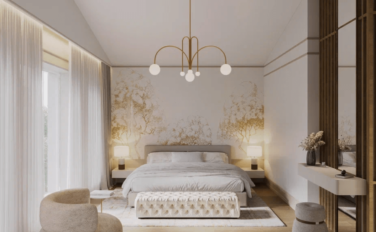 Второй этаж, мансардный, но полноценный за счет высоких потолков. В некоторых помещениях они достигают 3 метров, в иных – до 5,5 метров. Дело в том, что заказчик отказался отпускать потолок, поскольку хотел воздуха и пространства. И это было правильным решением! <br>
На втором этаже расположили кабинет, спальни детей, а также мастер-спальню. К спальне родителей примыкает небольшой санузел, гардеробная, отдельный балкон. Получилась очень комфортная родительская мини-зона отдыха от детского шума. Из панорамных окон в спальне и гостиной открывается потрясающий вид на сосны – уголок леса за окном. <br><br>

Заказчики просили разработать дизайн проект дома в современном стиле с элементами нео-классики. Была поставлена задача создать светлый и теплый интерьер. Подобного эффекта мы добились сочетанием текстуры натурального дерева с имитацией камня. На первом этаже уложили единое покрытие – керамогранит под камень. Сатиновая поверхность плитки эффектно преломляет свет из окон, словно немного играя. <br><br>
Стены практически везде предназначены под покраску, но встречается и комбинирование с деревянными и декоративными элементами. Так, лестничный холл решен в постельных тонах, а акцентом стала фреска с дополнительной проработкой и росписью на стенах. Тема природы также повторяется и в мастер-спальне у изголовья кровати. Изображение деревьев объединяет пространство дома с окружающим природным ландшафтом. Эту задачу решают и входные двери со стеклом, что делает изящный интерьер продолжением нежной природы. <br>

Интересным цветовым решением выделяются даже санузлы. Например, сочетание белого и молочного шоколада или песочного монохрома с насыщенно черным. Несмотря на то, что весь интерьер – светлый, он «разбавлен» яркими элементами. К примеру, такая деталь на люстре как малахитовые шары привносят изюминку в интерьер. <br>
Из всей стилистики дома выделяется кабинет. Поскольку глава семьи немало времени проводит за работой, он пожелал, чтобы в интерьере читались ноты английского стиля. С этой задачей мы справились, использовав деревянные панели на стенах в сочетании с обоями в английскую клетку. Отличным решением стали и встроенные книжные стеллажи. <br><br>

Этот загородный двухэтажный дом получился максимально комфортным и стильным, когда мечта клиентов была воплощена в лаконичном, но эффектном интерьере.
